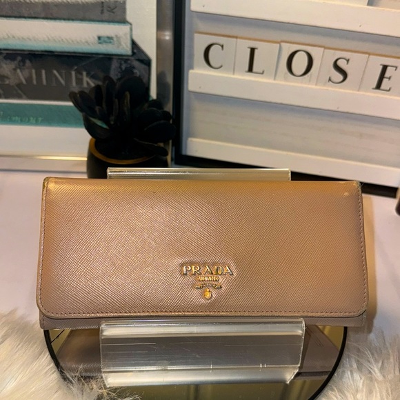 Prada Handbags - Prada Logo Plaque Saffiano Leather wallet GUC
